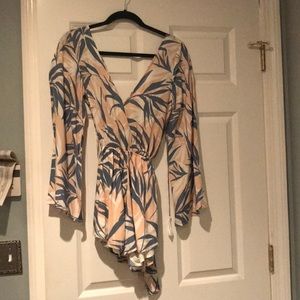 Kiss The Sky Pocketed Romper